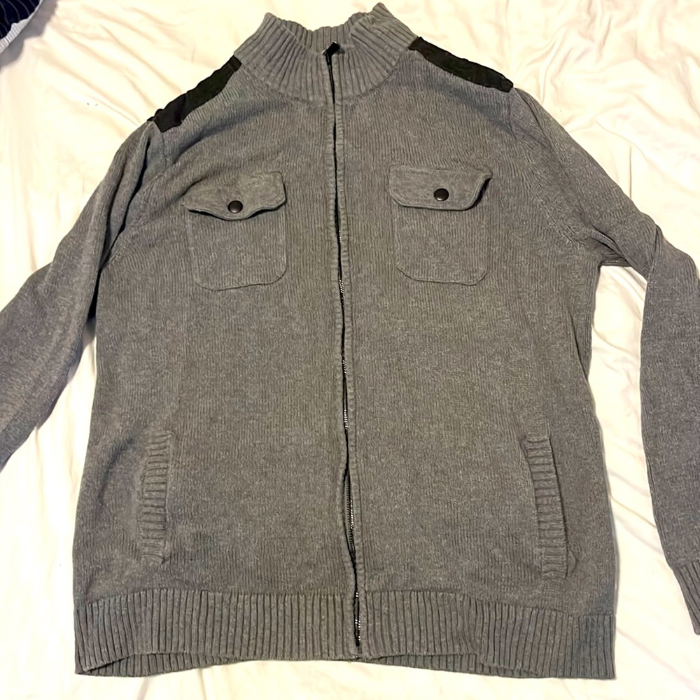APT. 9 long sleeved great sweater, that is fleece and it is extra large.